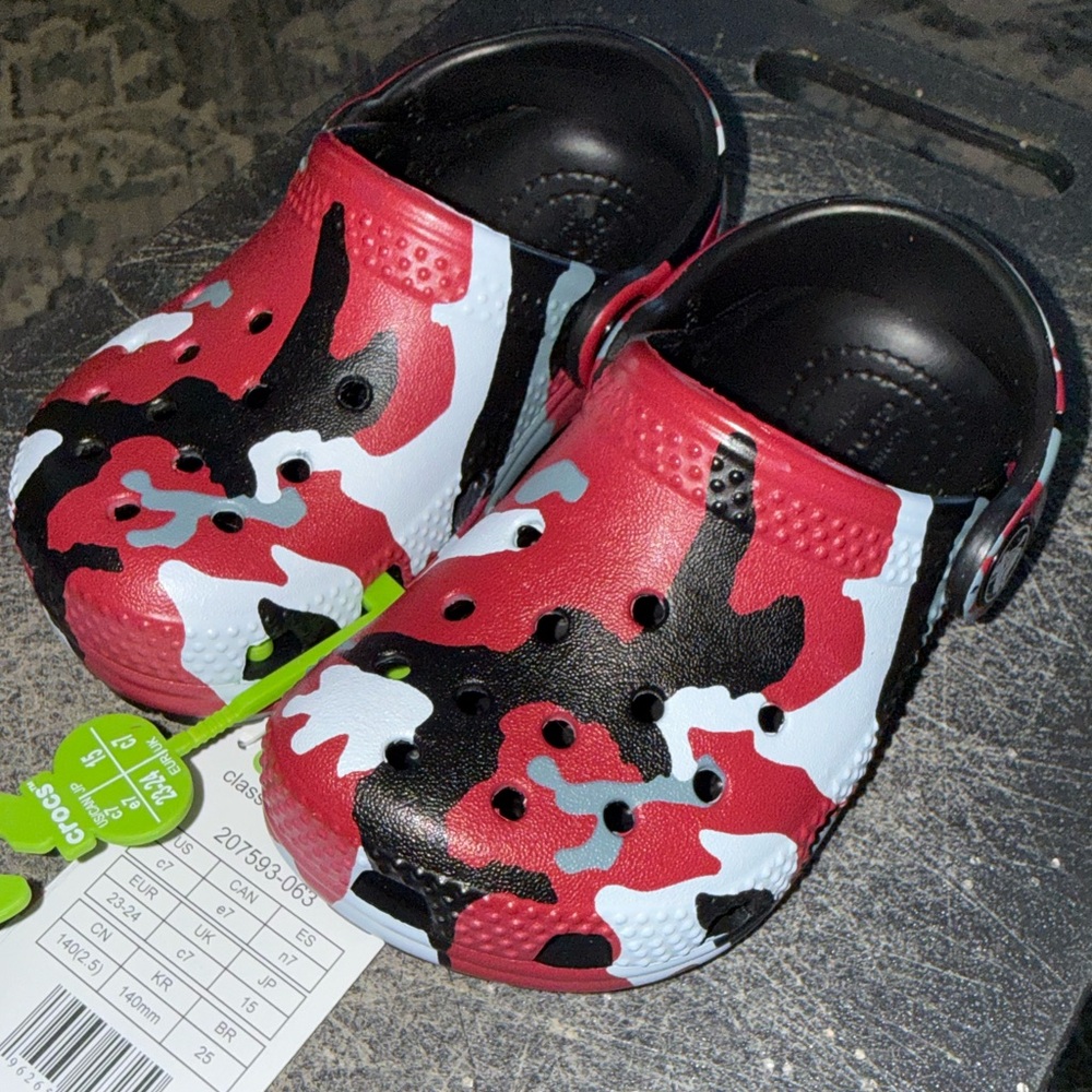 Crocs Classic Printed Camo Clogs in a black and red colorway